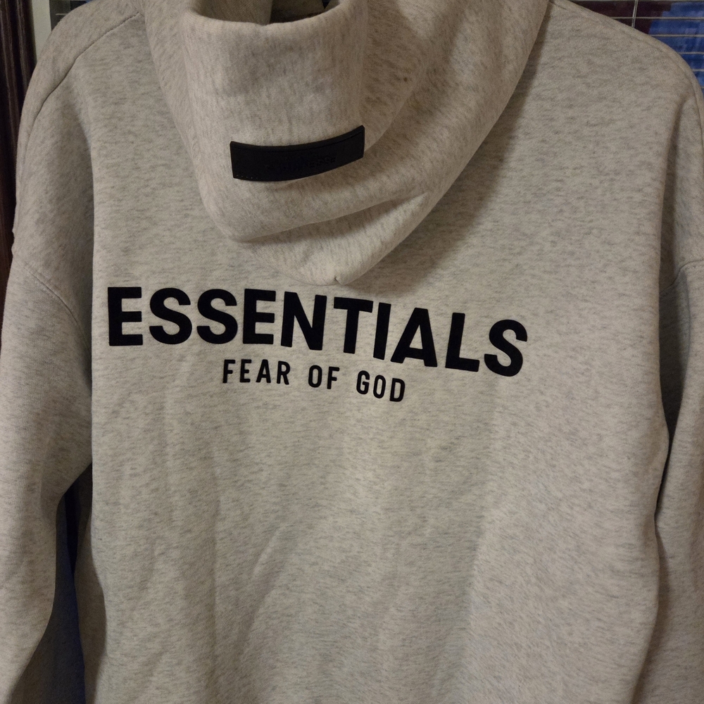 Fear of God ESSENTIALS Light Gray Hoodie with Black Logo